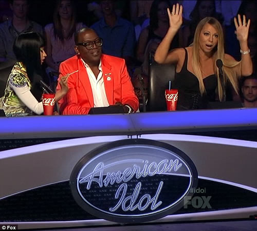 Nicki Minaj taunts Mariah Carey by waving cotton bud at Her on American Idol