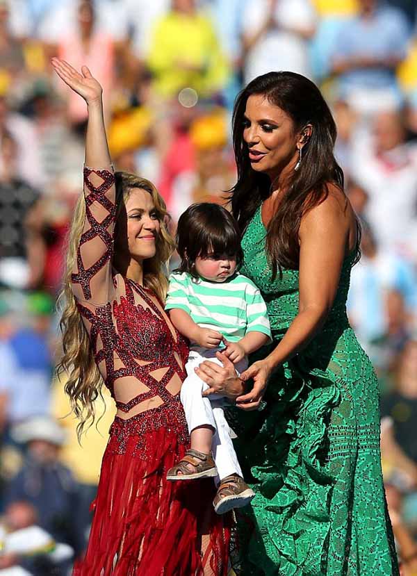 Shakira carries son Milan