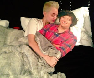 Miley Cyrus Climbs into Bed with Harry Styles