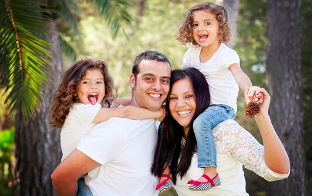 happy-family-in-vacation-having-fun-at-the-park