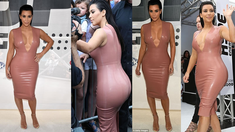 Kim Kardashian Squeezes into Latex Dress With a VERY Plunging Neckline