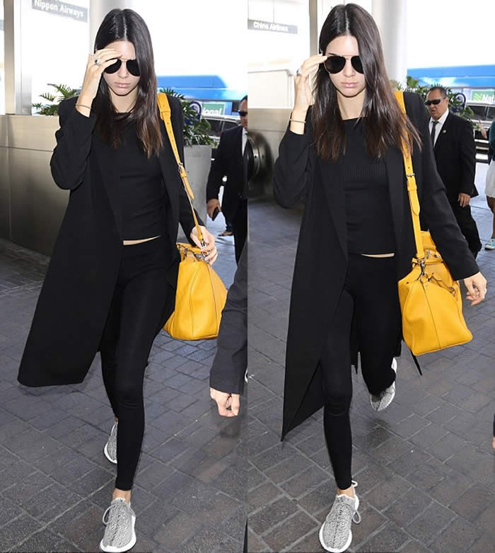 Kendall Jenner pins in tight black leggings