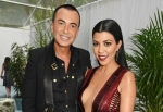 Kourtney Kardashian Oozes Sex Appeal in a Low-Cut Dress on the Red Carpet