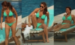 Melanie Sykes, 46, Flaunts Her Washboard Abs in a Skimpy Green Bikini