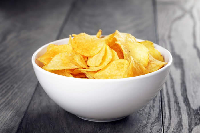 Eat chips from a bowl
