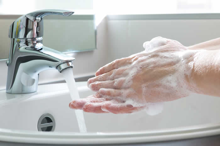 Not washing your hands often or thoroughly enough