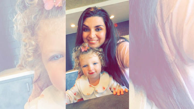 Christian Stinnett with her 2-year-old daughter