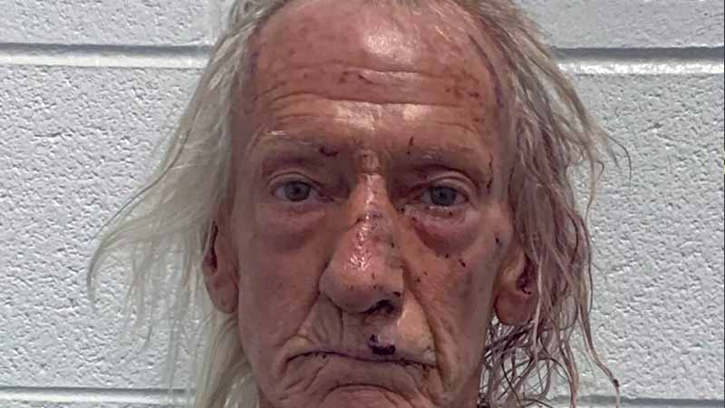 boy 26 times after taking a knife from a belt holder
